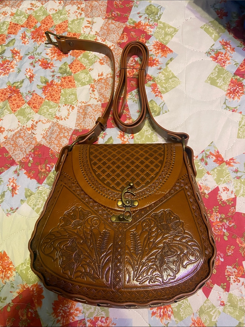 Leather Embossed Crossbody Bag in Brown Alma Mia brand